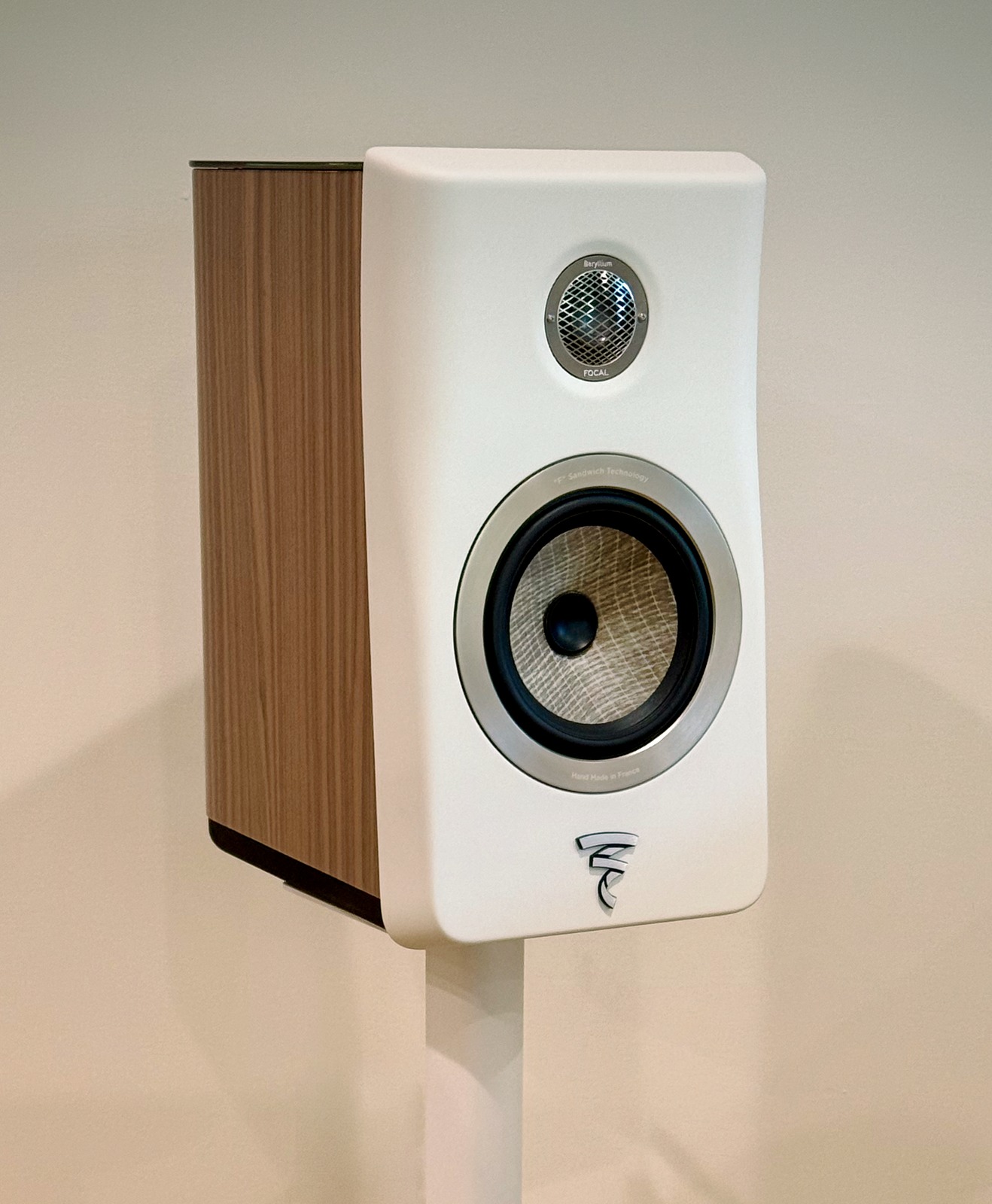 Focal Kanta 1 surround speaker on a white stand